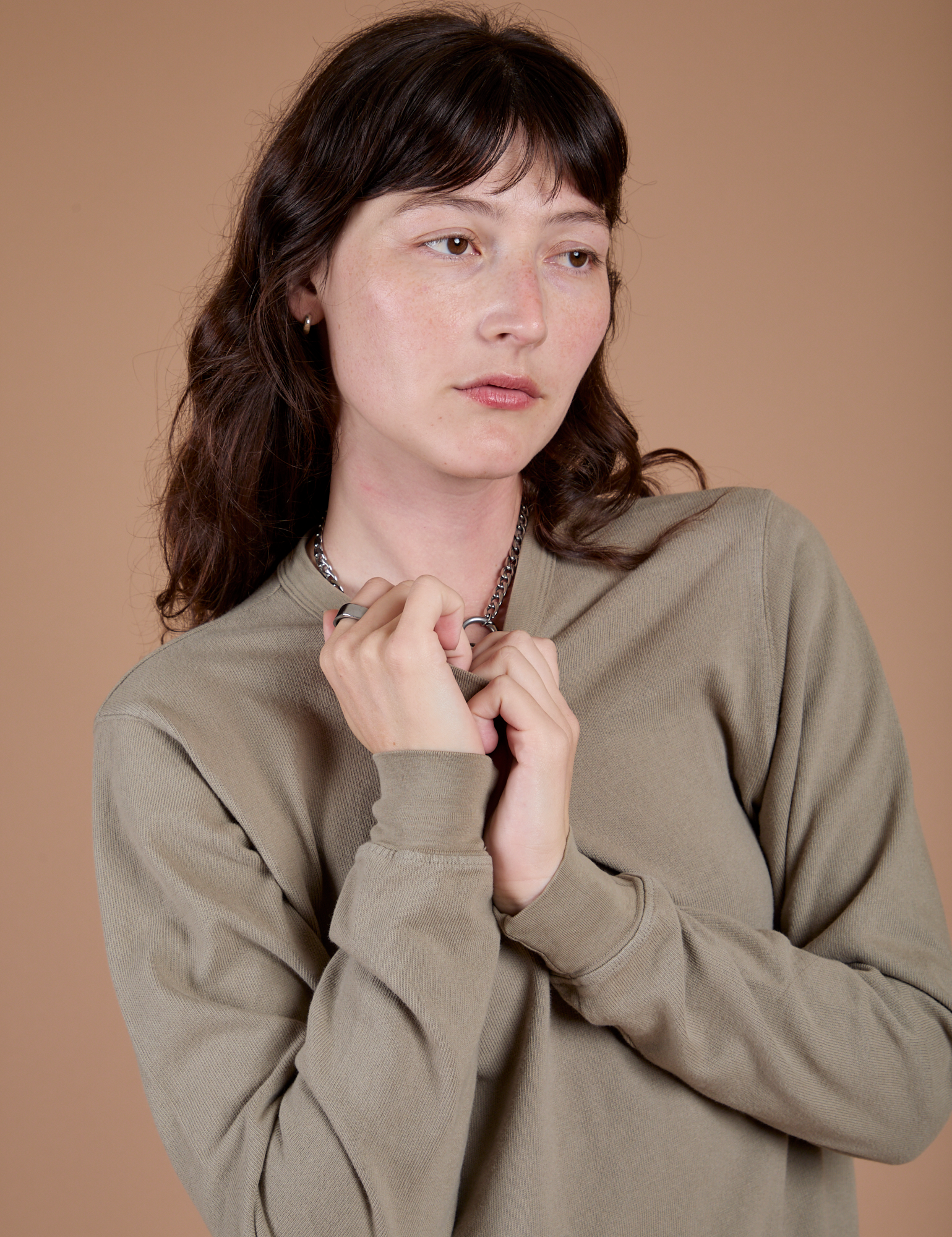 Long Sleeve Burly Tee in Khaki Grey front close up on Alex
