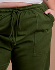 Organic Action Pants in Evergreen front close up on Juliet