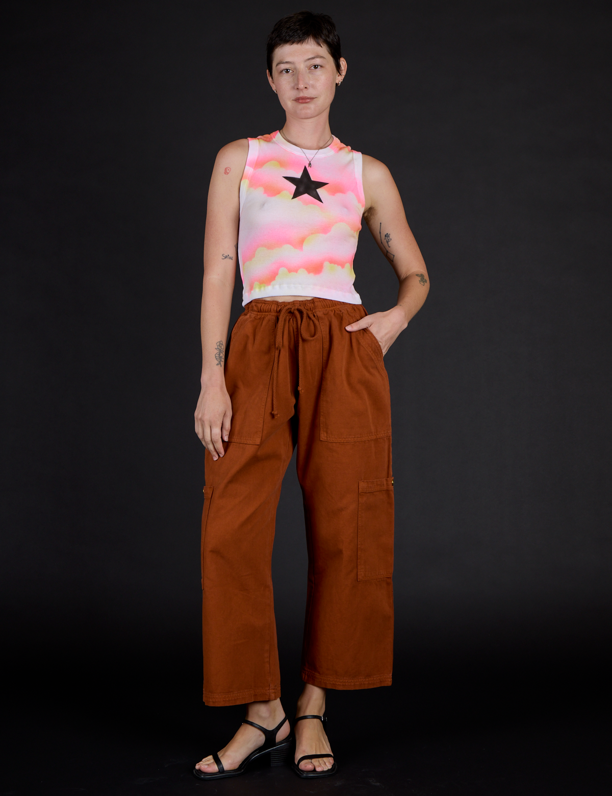 Alex wearing the Black Star Airbrush Muscle Tee with Burnt Terracotta Drop Pocket Cargo Pants