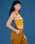 Painted Muscle Tee in Mustard Yellow side view on Alex