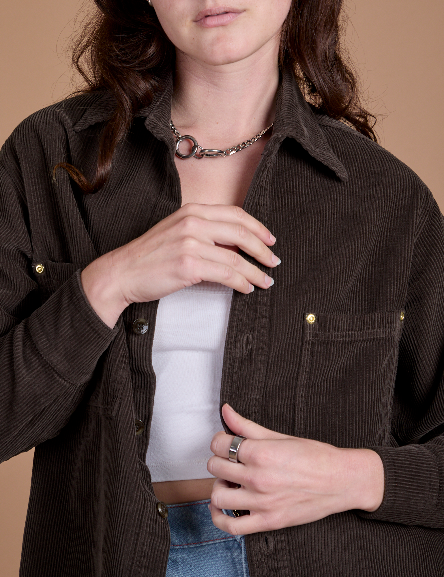 Front close up of Cropped Corduroy Overshirt in Espresso Brown on Alex