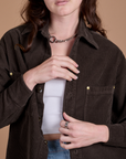 Front close up of Cropped Corduroy Overshirt in Espresso Brown on Alex