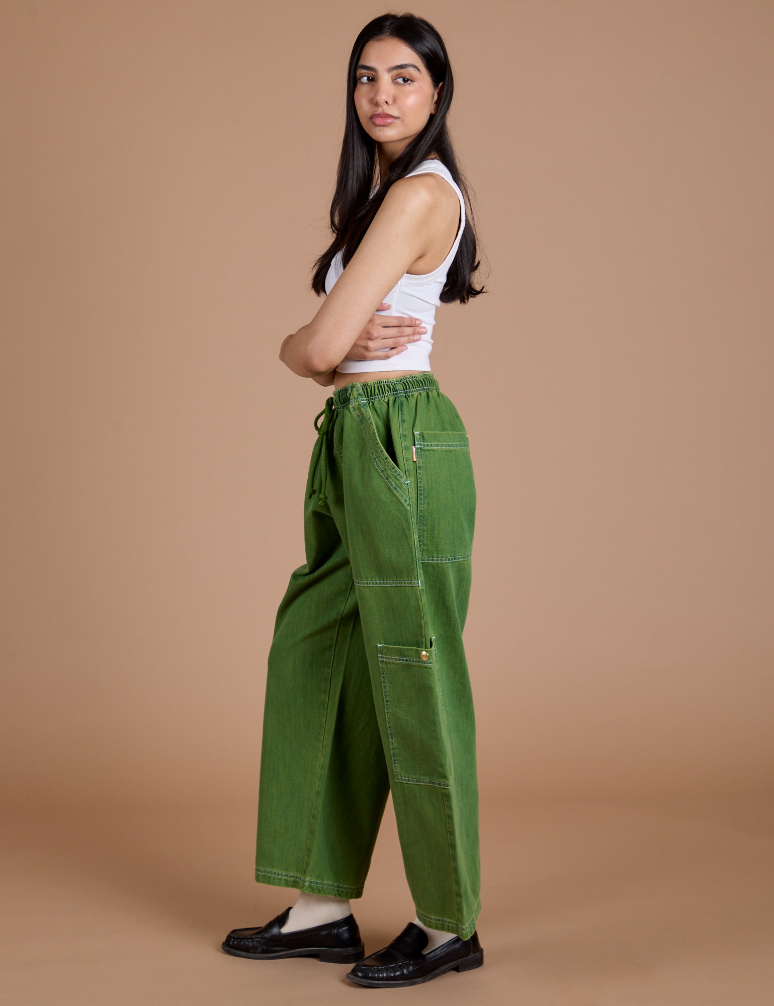 Denim Drop Pocket Pants in Green Overdye side view on Anjaline