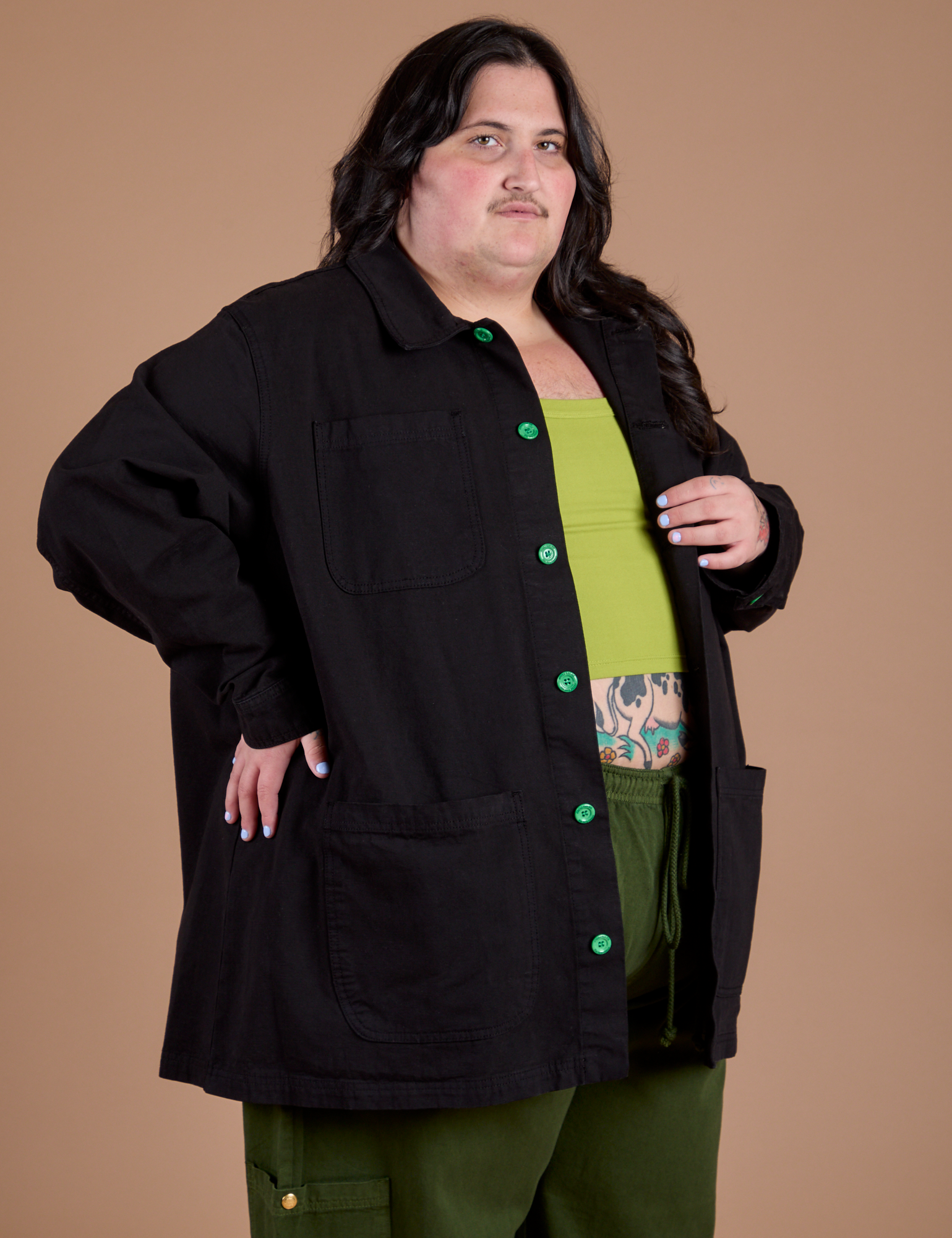 Angled front view of Ripstop Field Coat in Basic Black on Sam