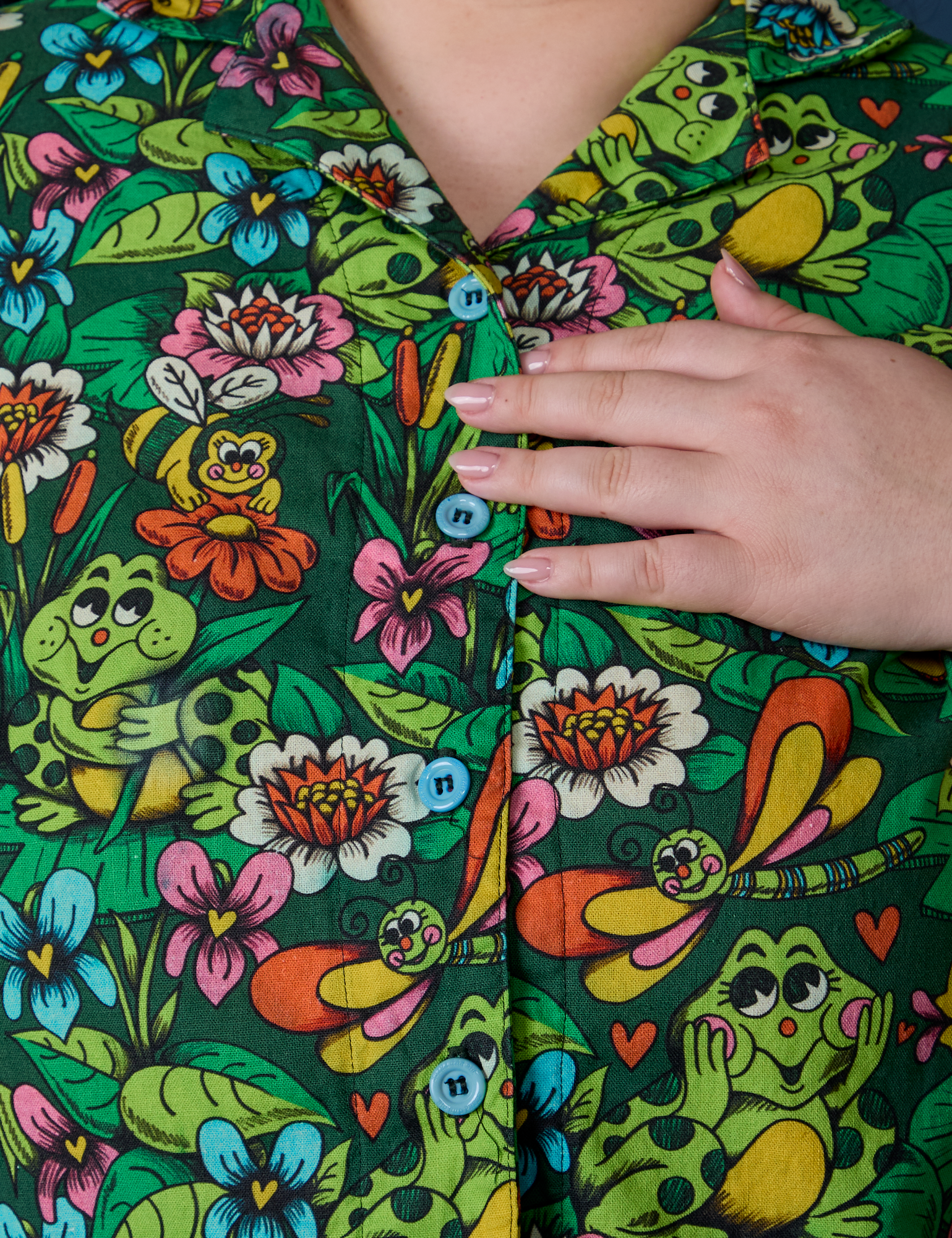 Pond Party Pantry Button-Up front close up featuring baby blue buttons 