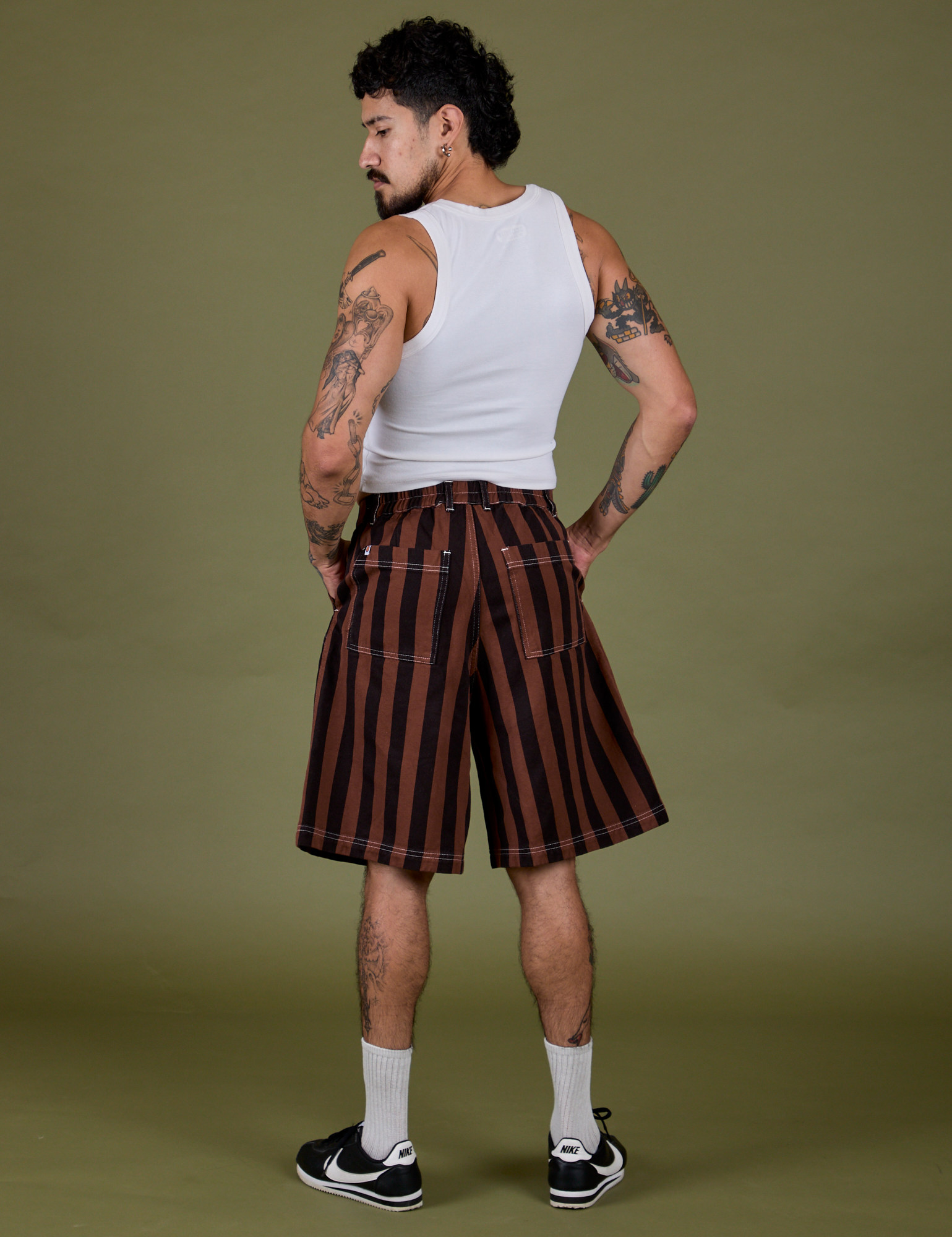 Back view of Longline Work Shorts in Fudgesicle Brown and vintage tee white Cropped Tank