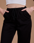 Organic Action Pants in Basic Black front close up on Alex