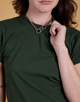 Organic Vintage Tee in Swamp Green front close up on Alex