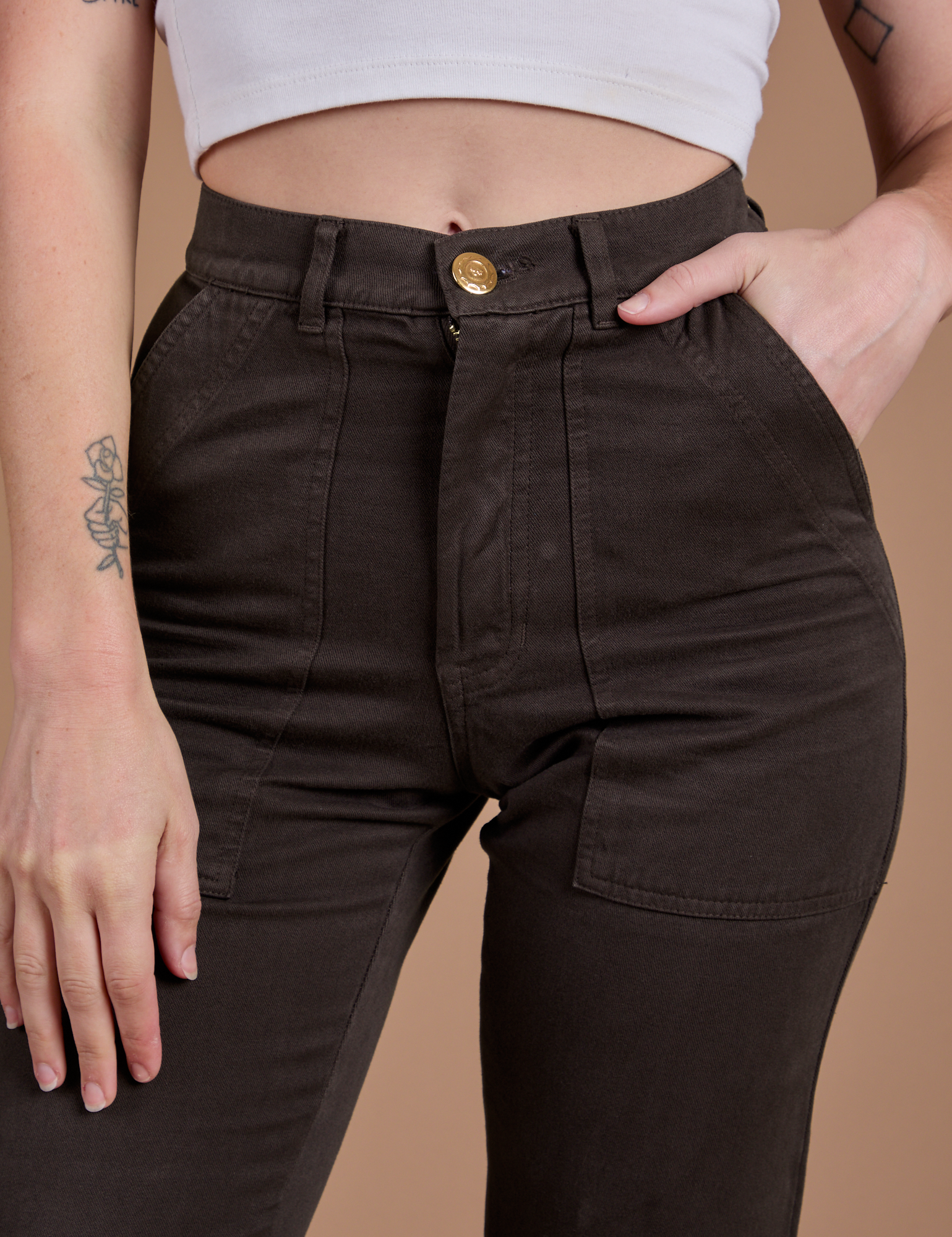 Organic Work Pants in Espresso Brown front close up on Alex