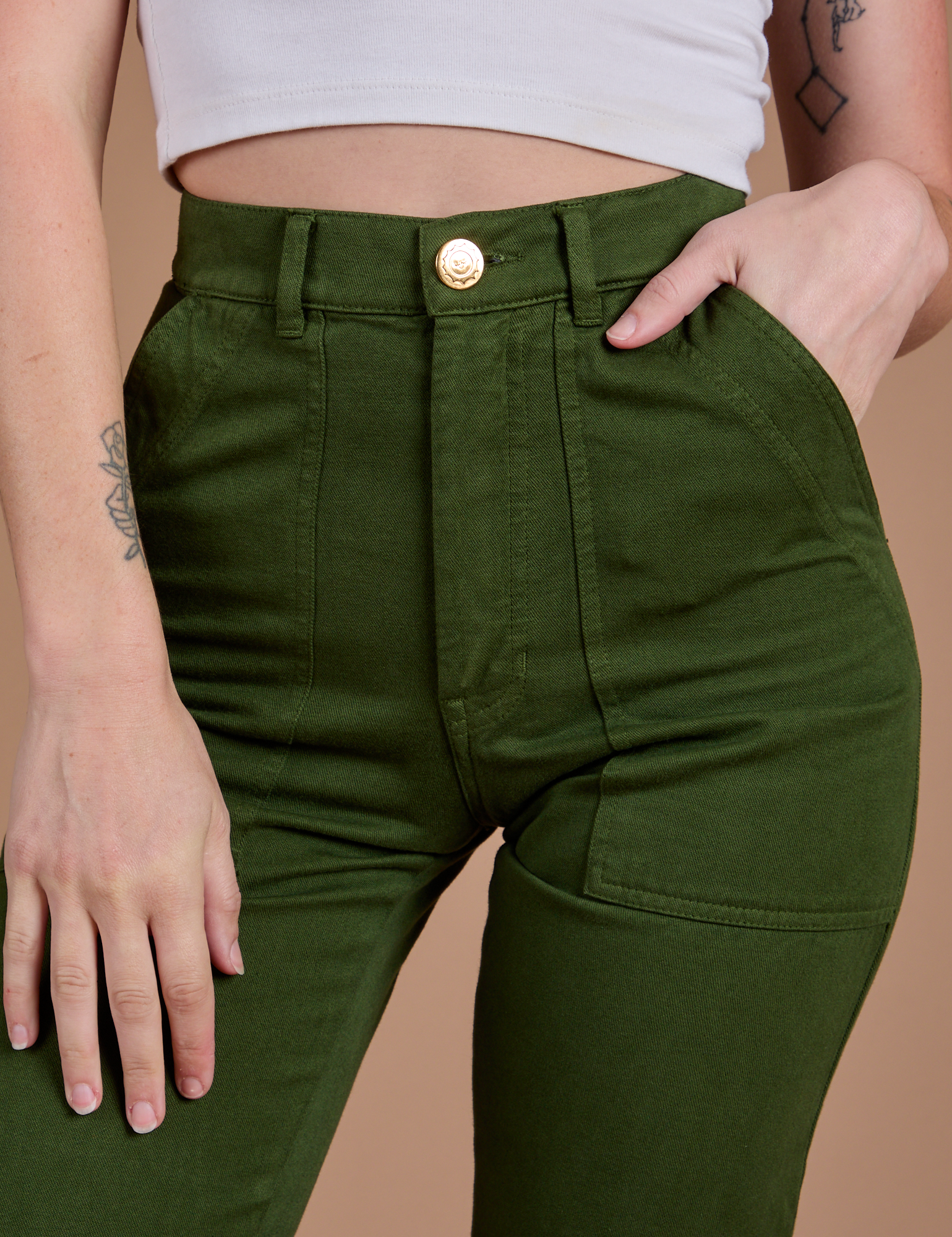 Organic Work Pants in Evergreen front close up on Alex