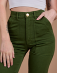 Organic Work Pants in Evergreen front close up on Alex