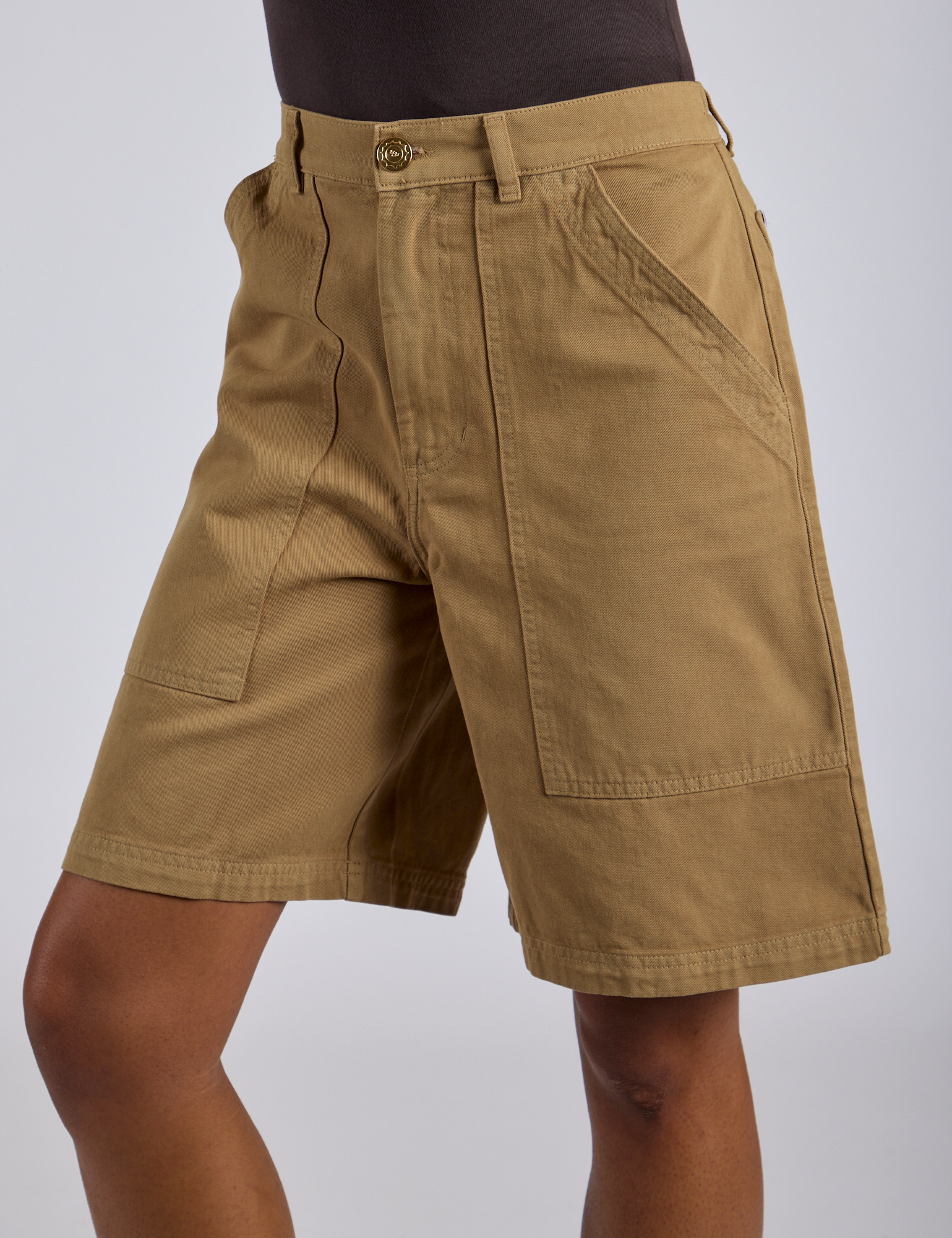 Close up of Longline Work Shorts in Desert Brown on Kira