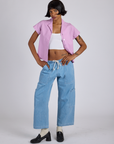 Kira is wearing Pantry Button-Up in Lilac Purple and light wash Denim Drop Pocket Pants