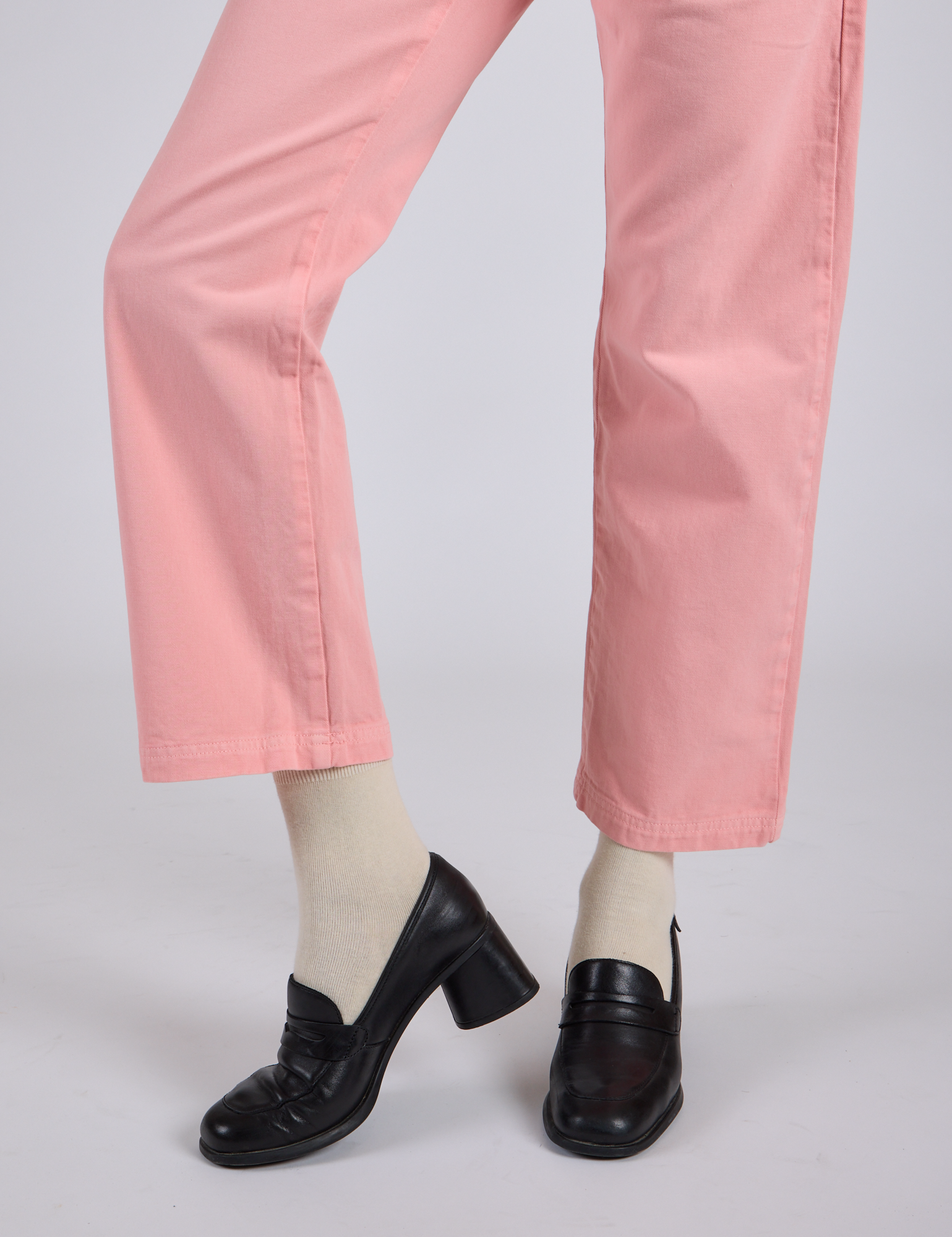 Work Pants in Baby Pink pant leg close up on Kira