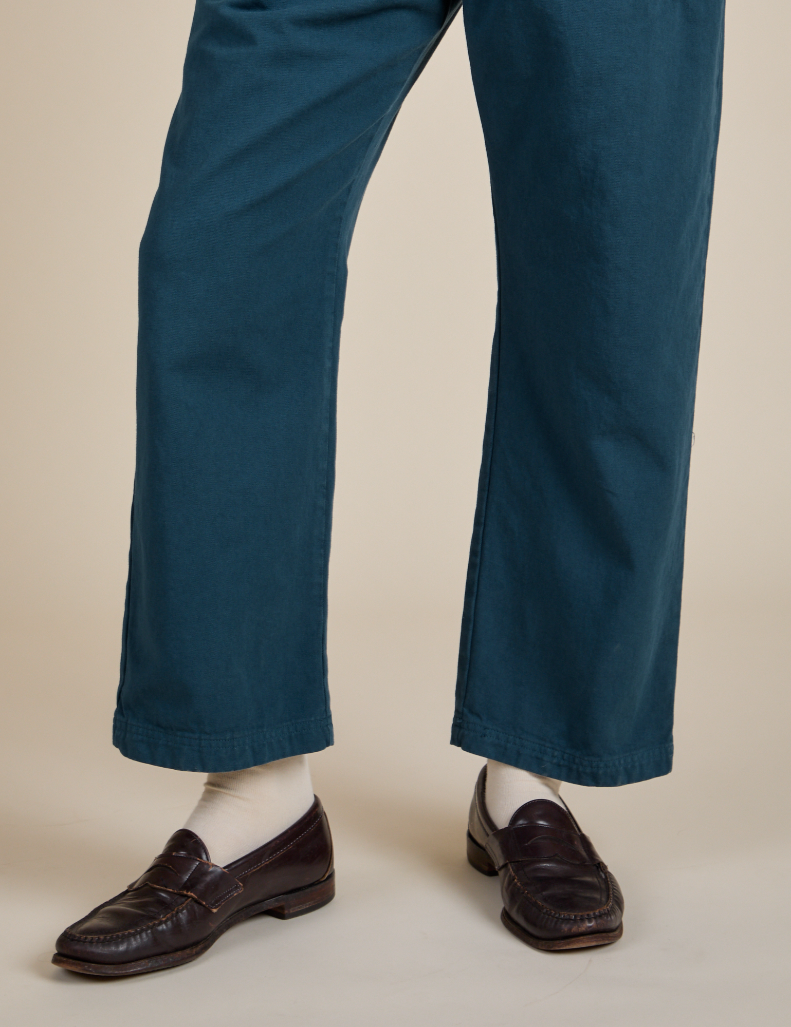 Short Sleeve Jumpsuit in Lagoon pant leg close up on Quinn