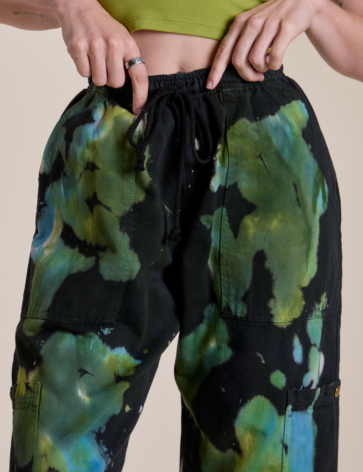 Magic Waters Drop Pocket Pants in Green Pool front close up on Alex