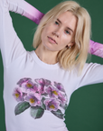 Front close up of Floral Long Sleeve Baby Tee in Pink on Madeline