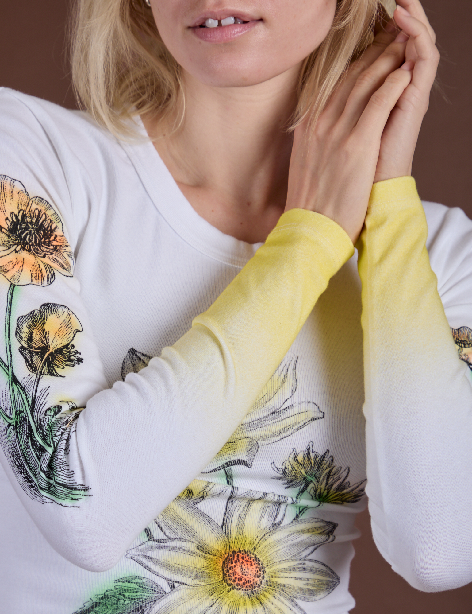 Floral Long Sleeve Baby Tee in Yellow close up of sleeves that have a yellow gradient