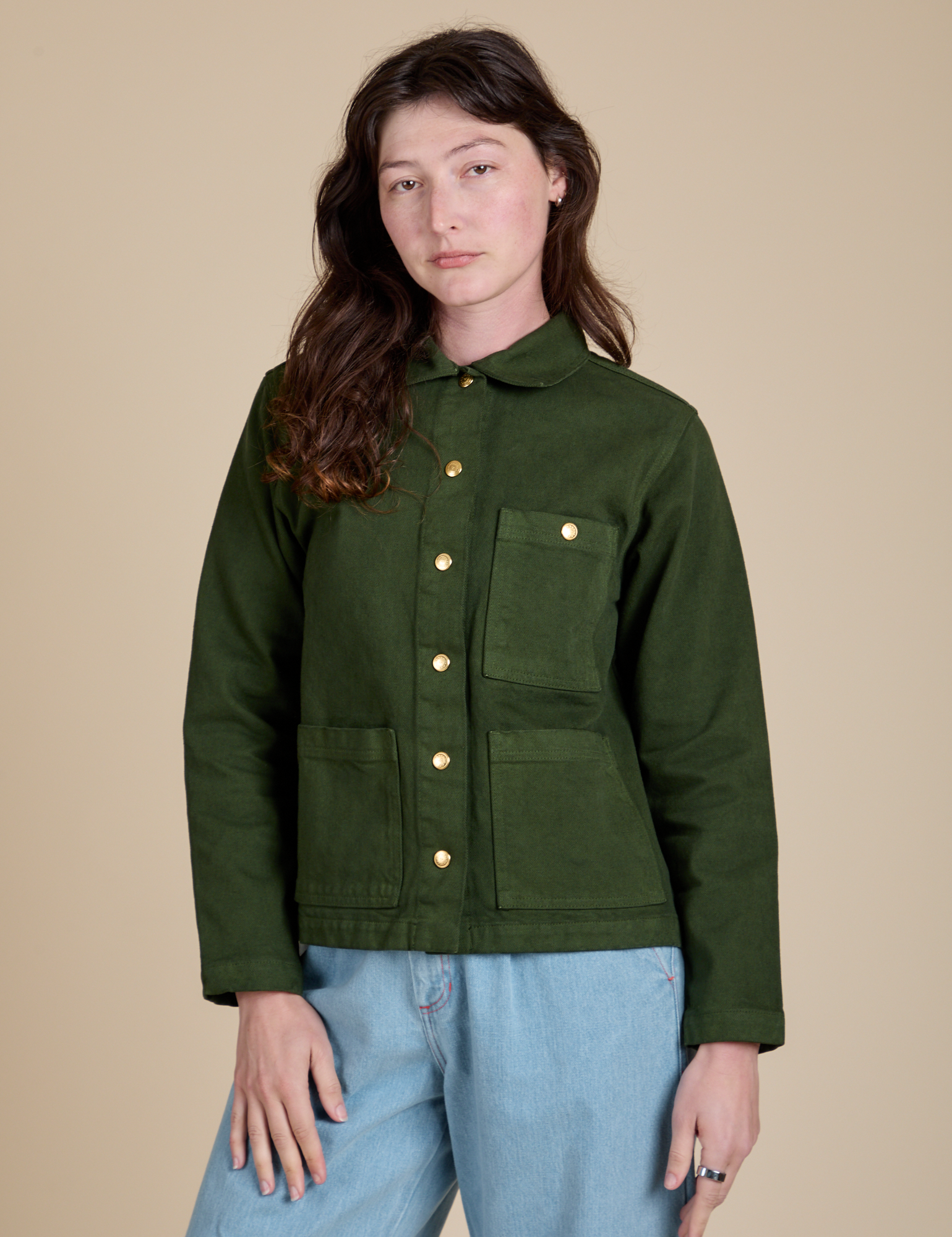 Alex is 5'8" and wearing P Denim Work Jacket in Evergreen