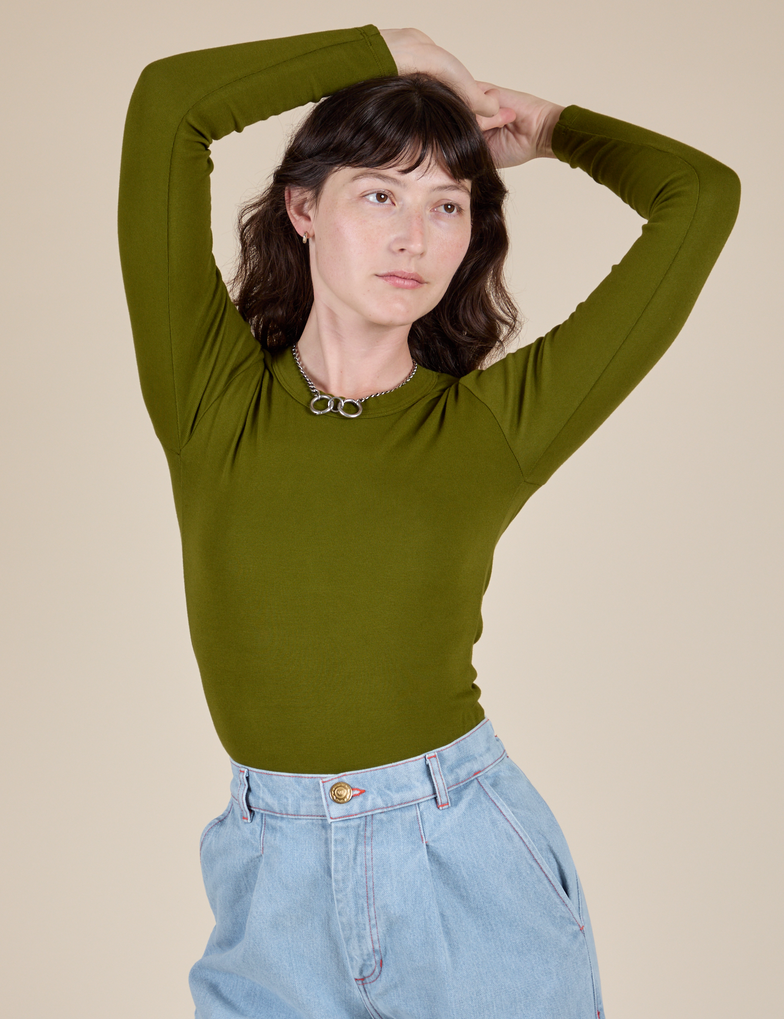 Long Sleeve Baby Tee in Summer Olive worn by Alex