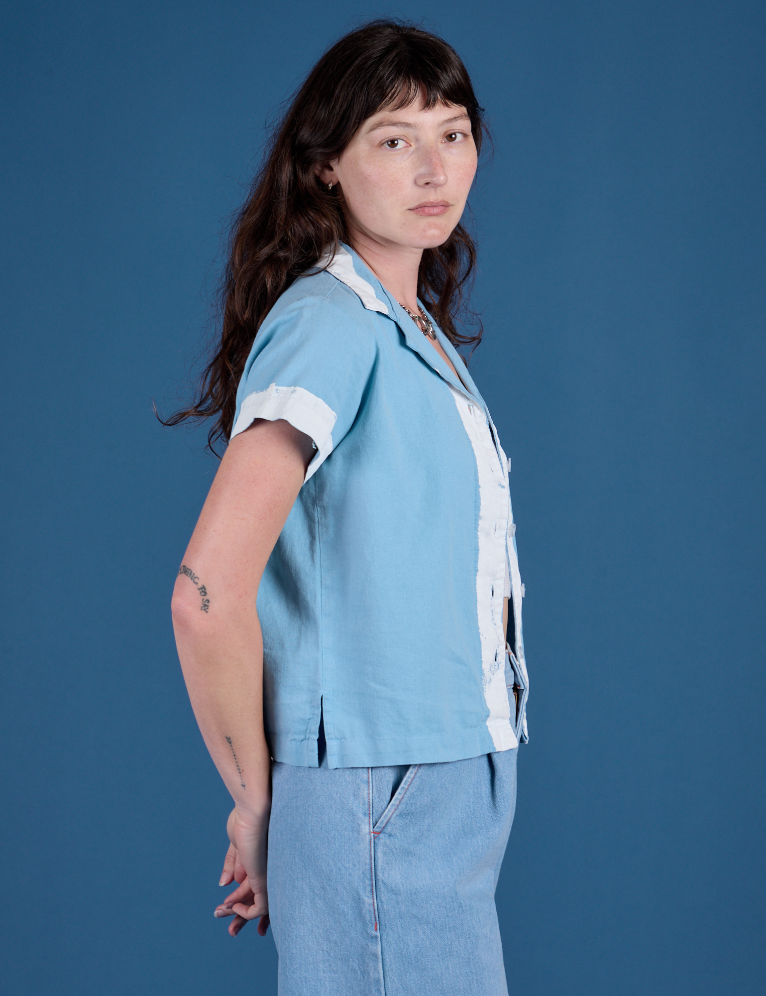 Painted Pantry Button-Up in Baby Blue side view on Alex