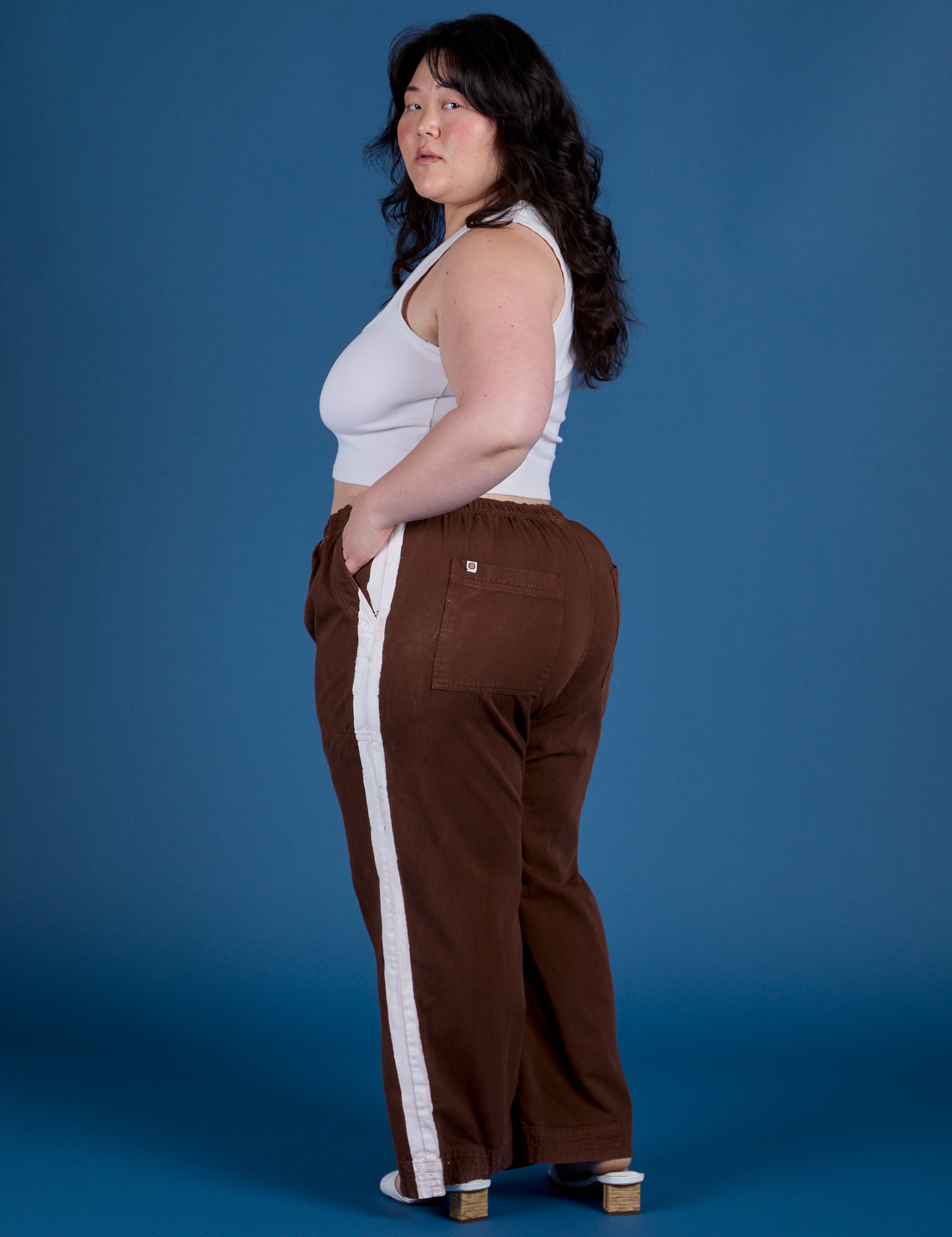 Painted Action Pants in Fudgesicle Brown angled back view on Ashley