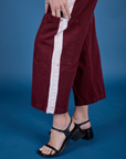 Painted Drop Pocket Cargo Pants in Red Wine close up of side pant leg pocket