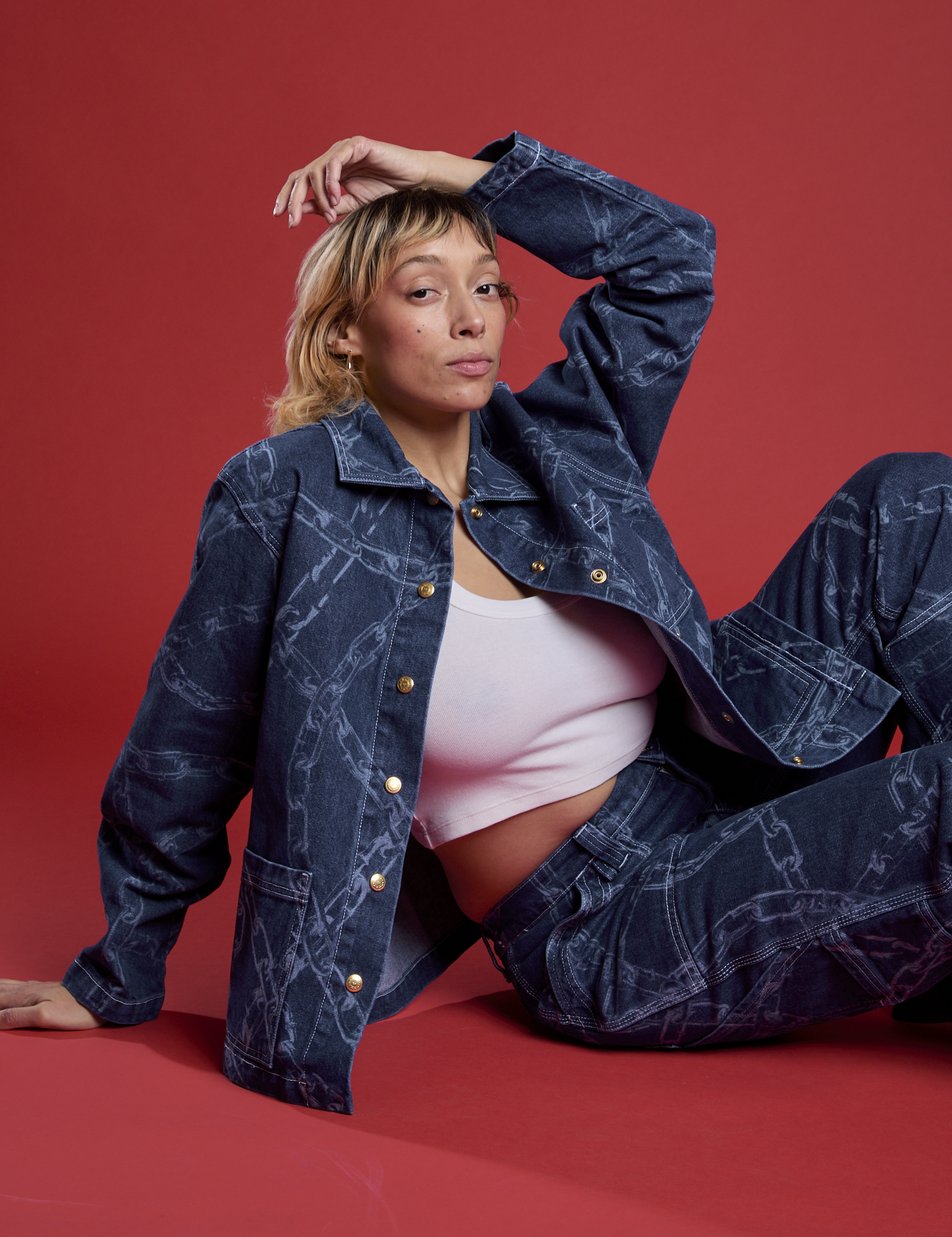 Tiara wearing the Chain Link Work Jacket paired with matching Chain Link Carpenter Jeans