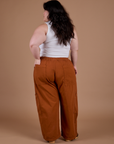 Drop Pocket Cargo Pants in Burnt Terracotta back view on Ashley