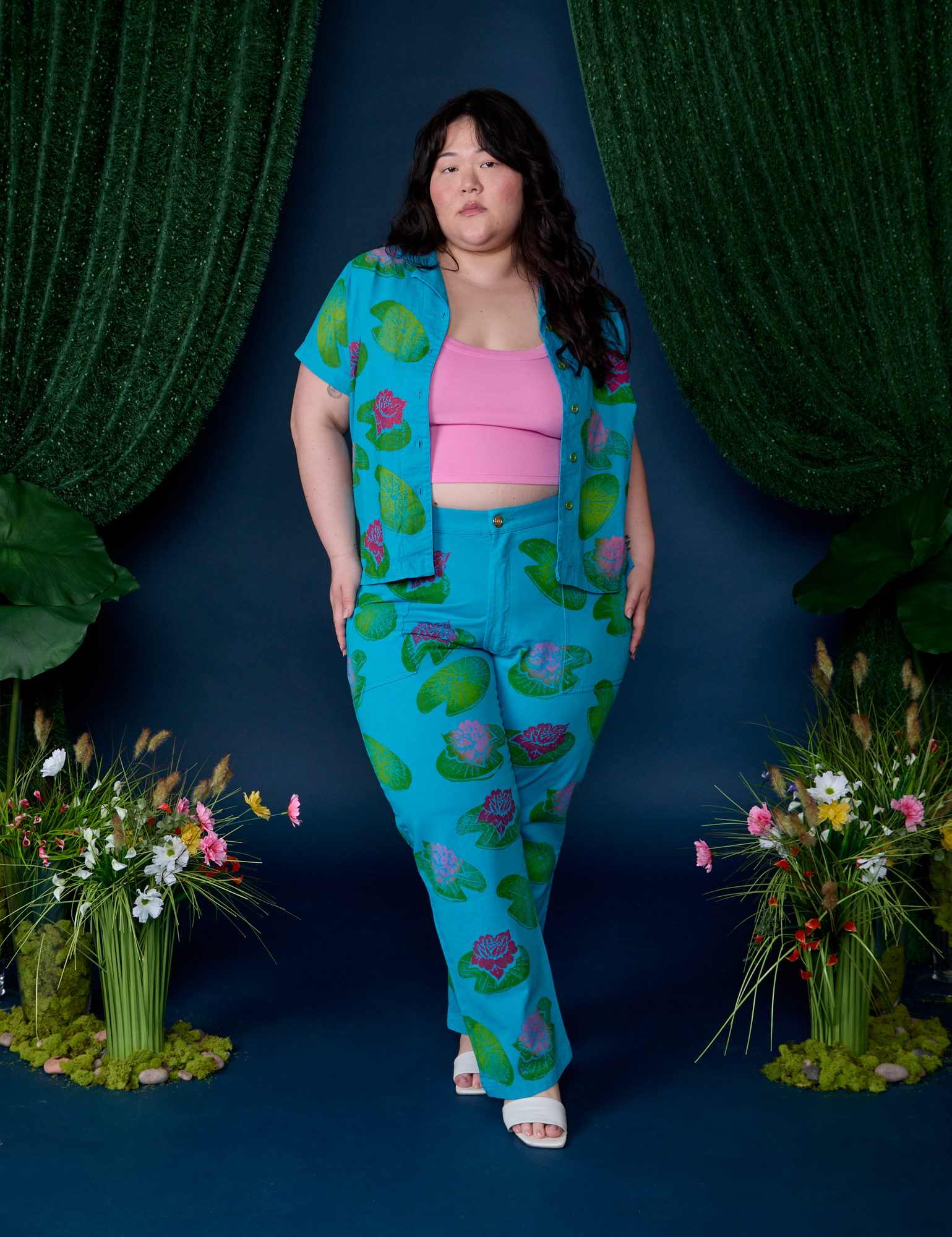 Ashley is wearing Paintstamped Pantry Button-Up in Lilypad and matching Work Pants