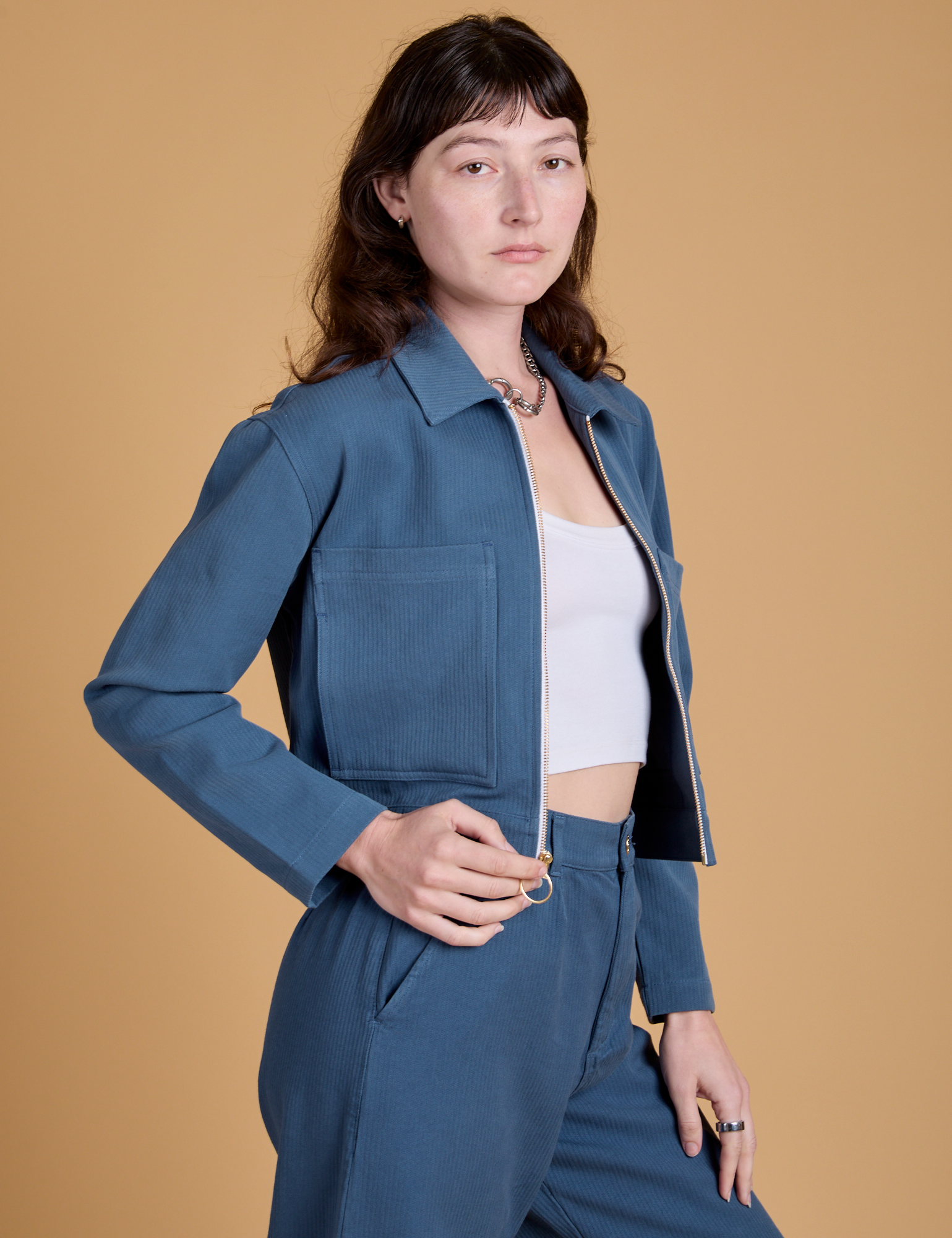 Angled front view of Heritage Mechanic Jacket in French Blue on Alex