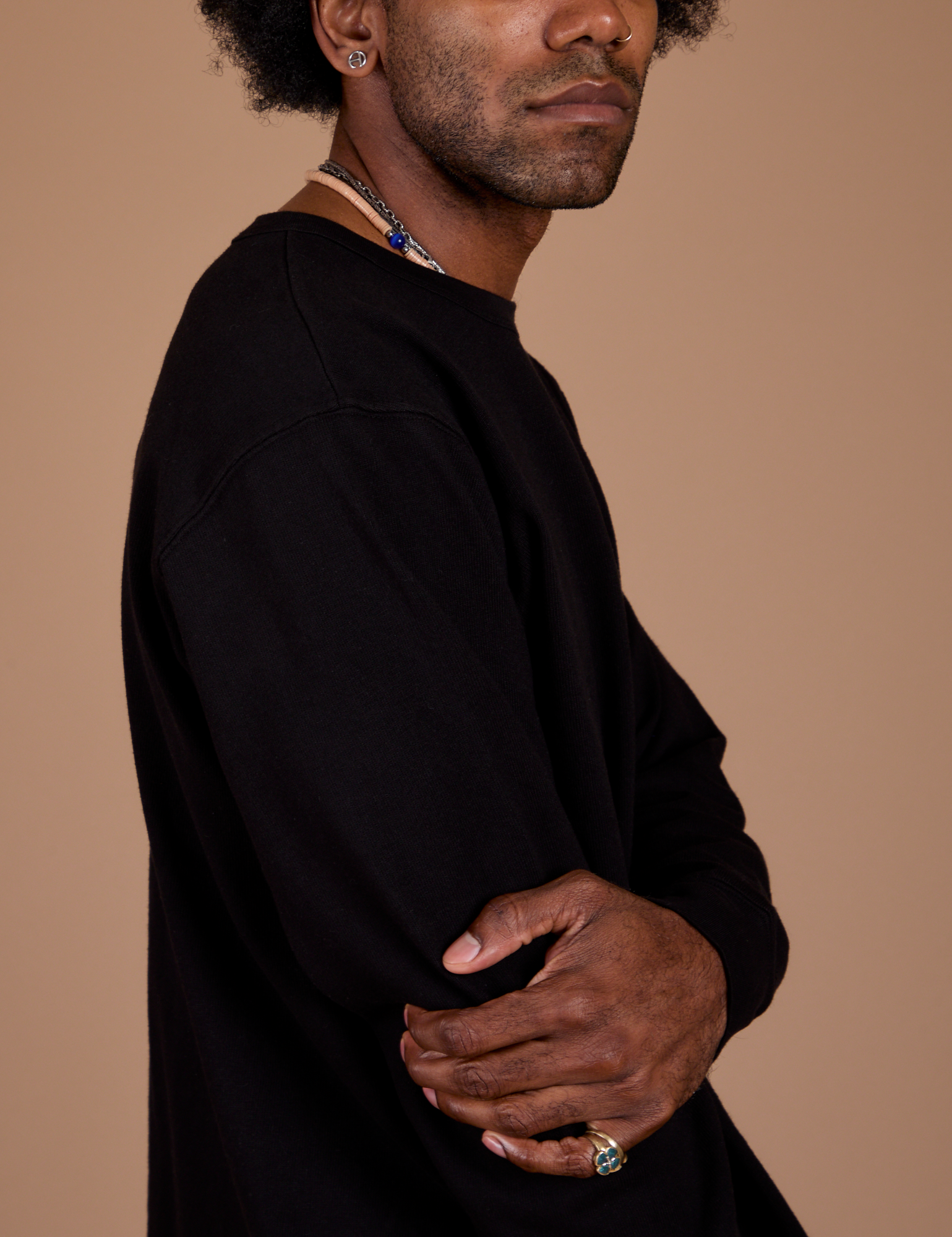 Side view close up of Long Sleeve Burly Tee in Basic Black on Jerrod