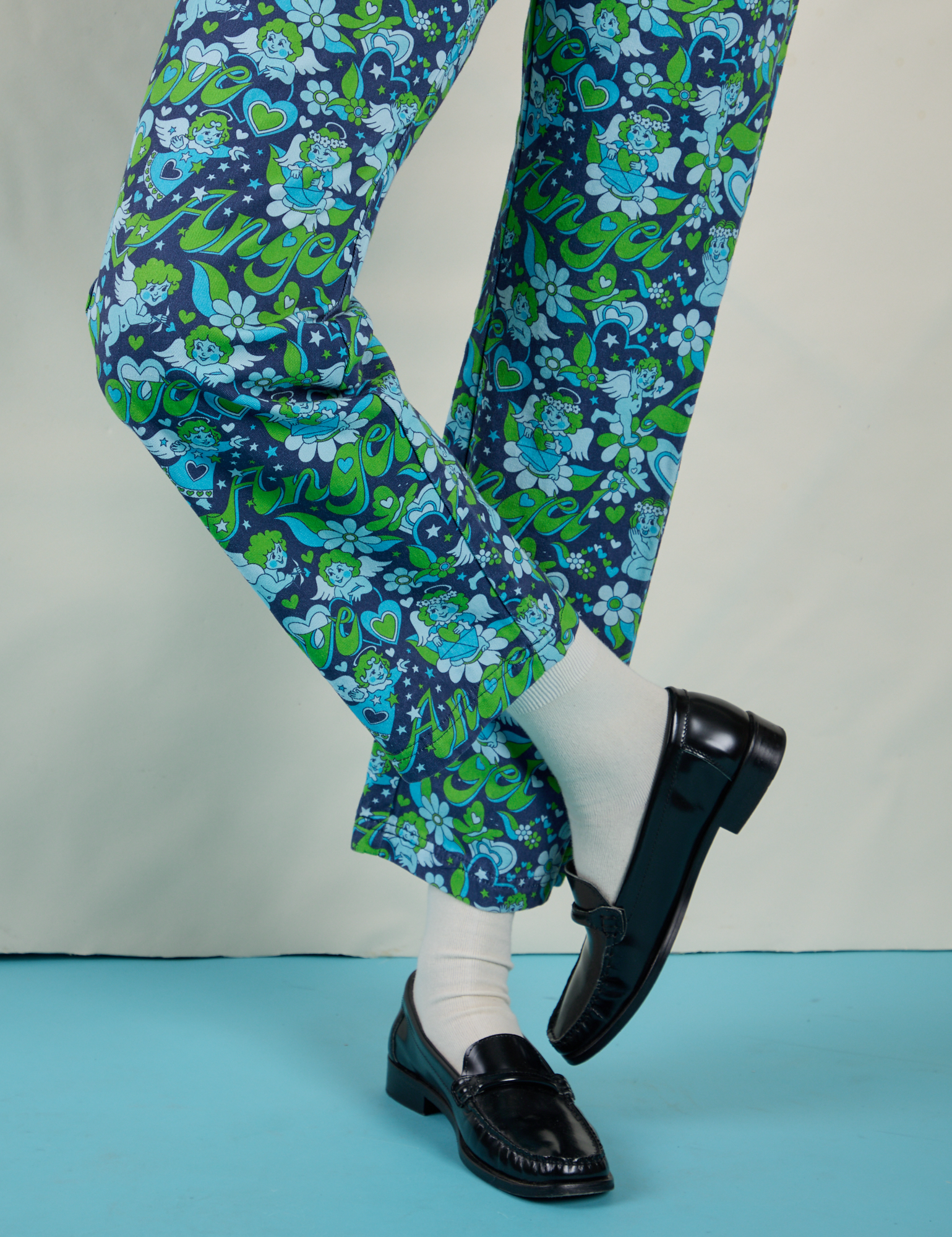 Angel Print Jumpsuit pant leg close up on Shahana