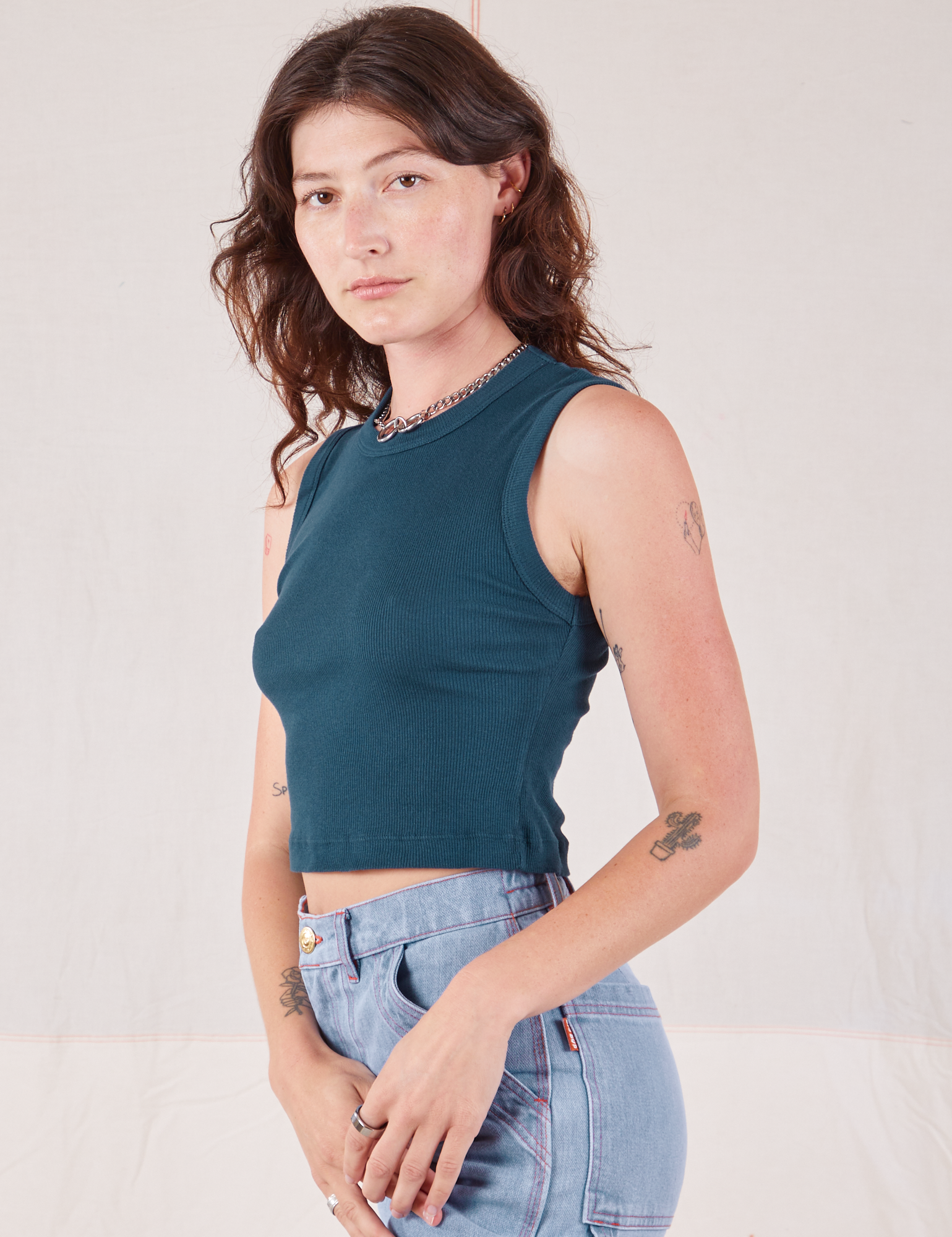 Muscle Tee in Lagoon angled front view on Alex