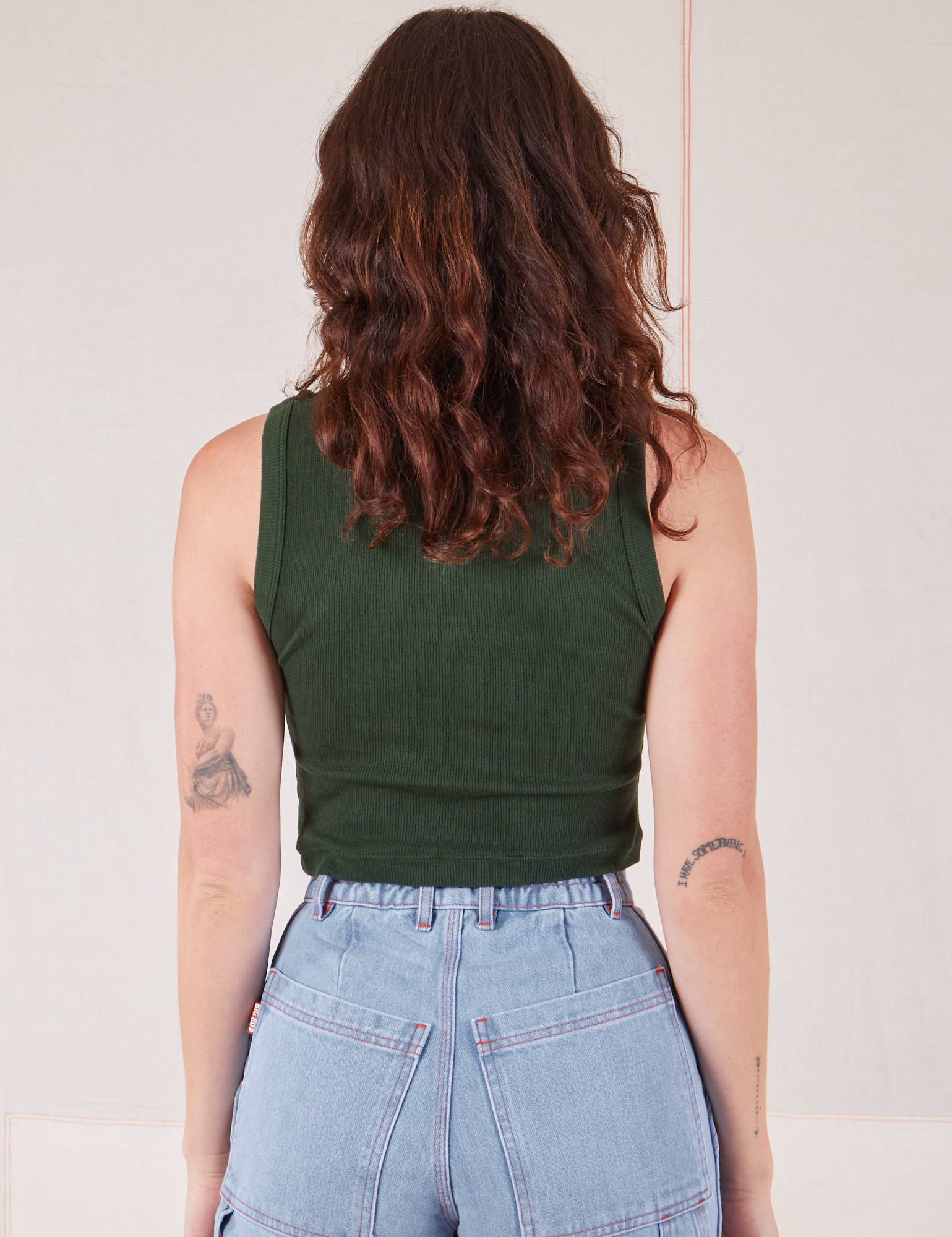 Muscle Tee in Swamp Green back view on Alex