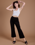 Organic Action Pants in Basic Black and vintage tee white Cropped Tank on Alex
