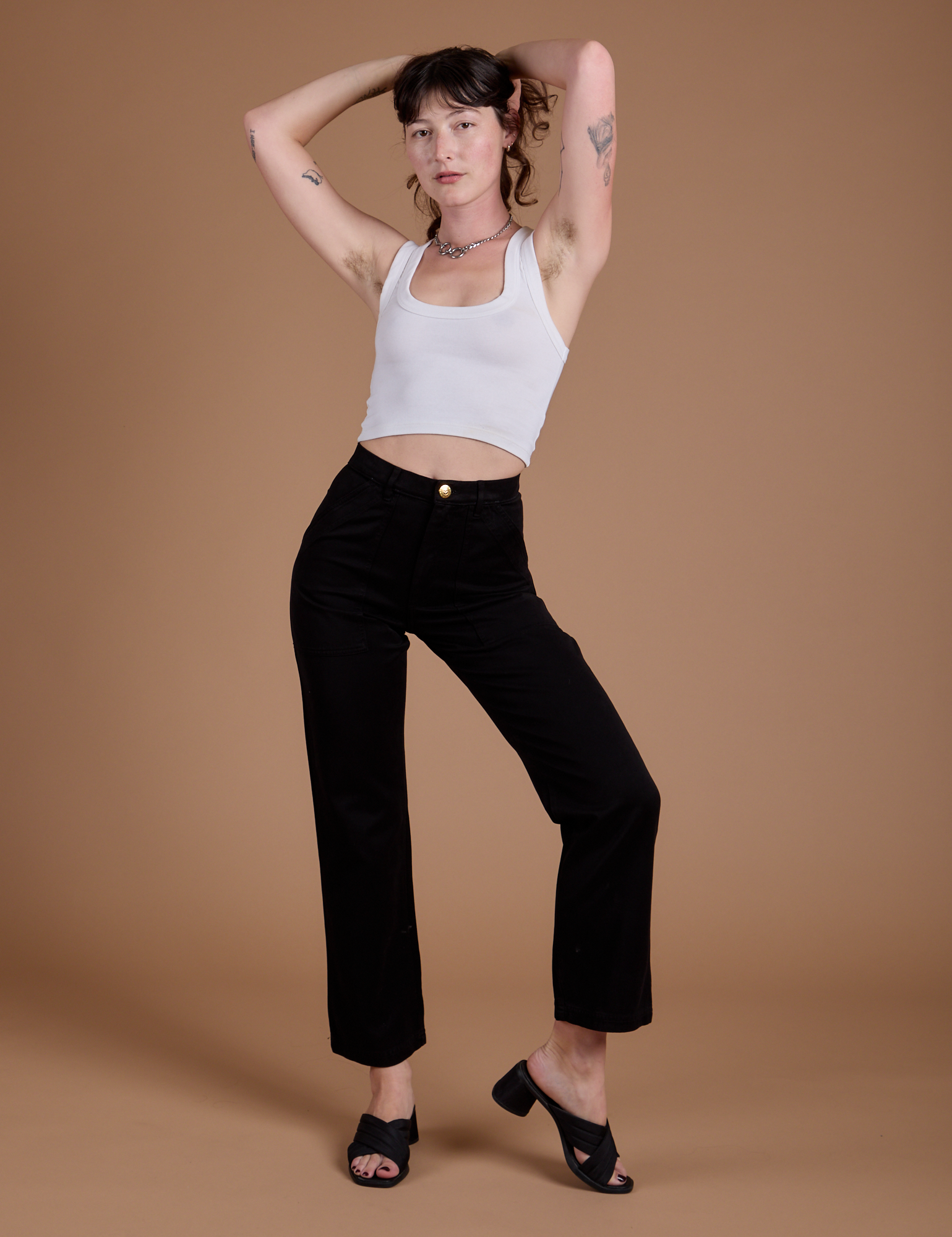Organic Work Pants in Basic Black and vintage tee white Cropped Tank worn by Alex
