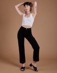 Organic Work Pants in Basic Black and vintage tee white Cropped Tank worn by Alex