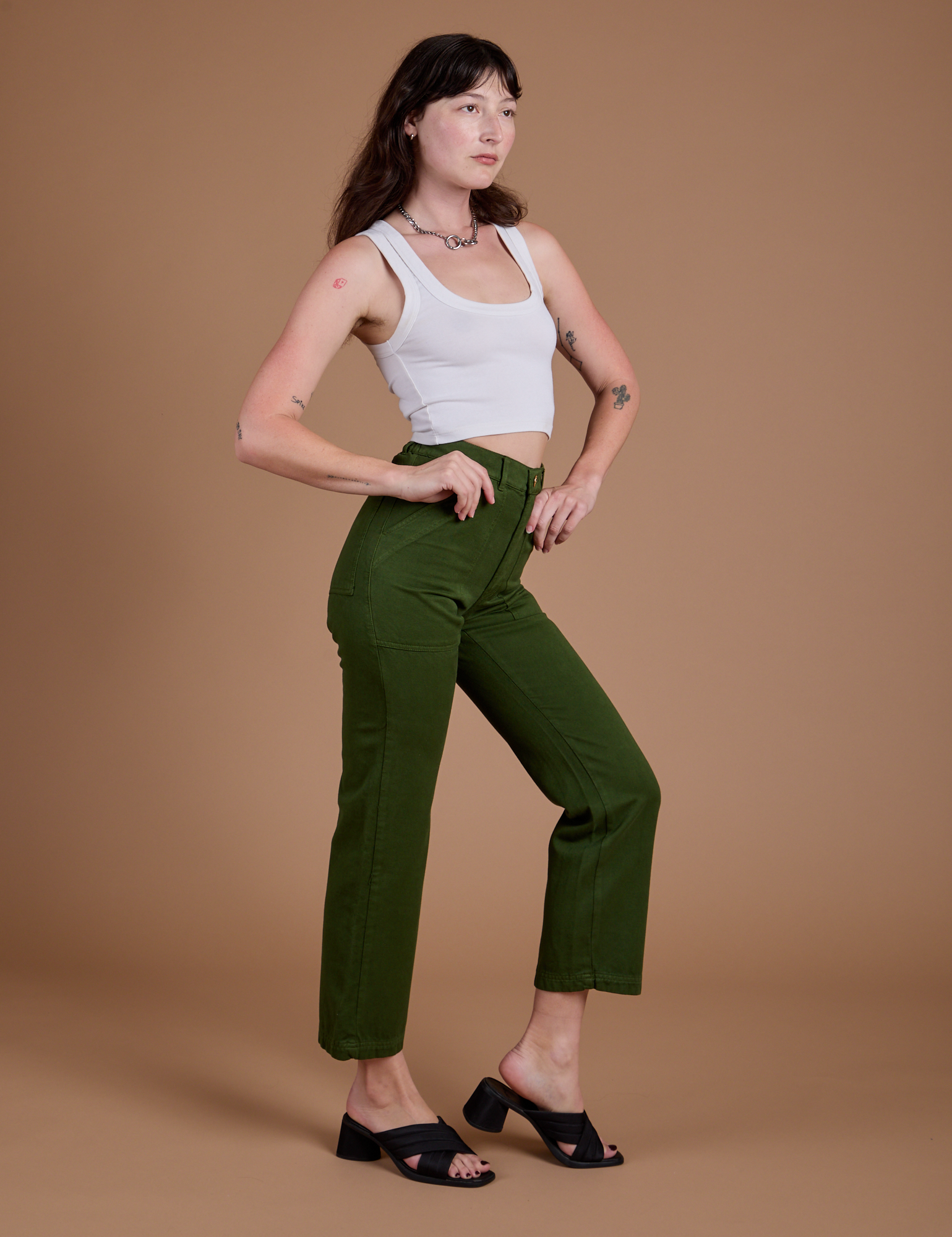 Side view of Organic Work Pants in Evergreen on Alex