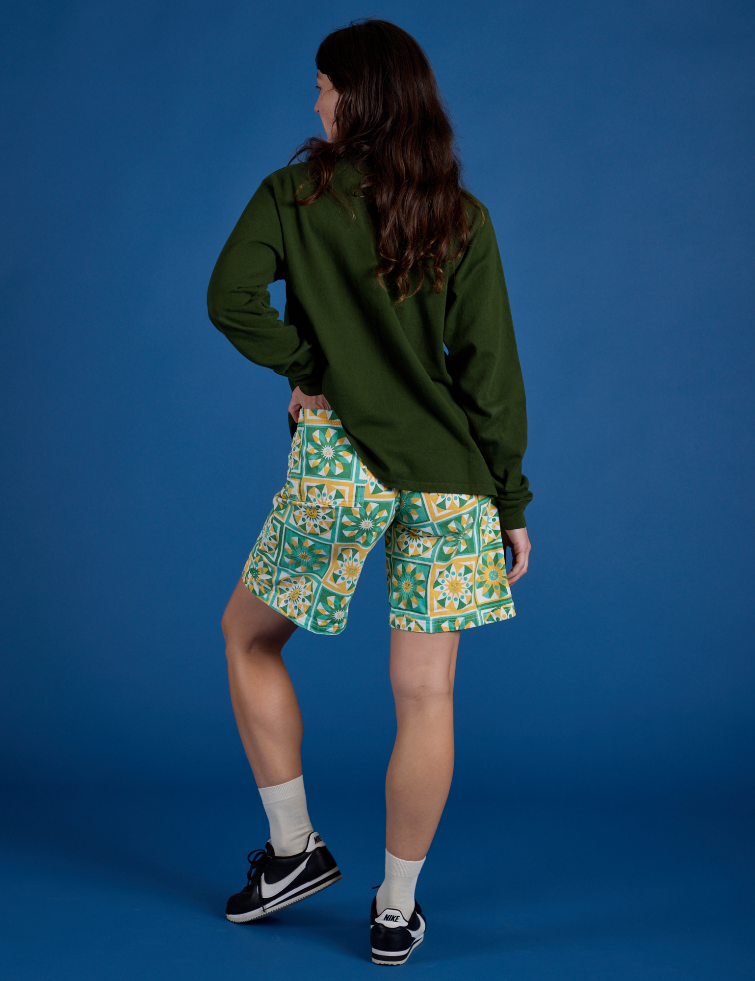Longline Work Shorts in Spring Quilt Print back view on Alex