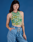 Deep-Cut Racerback Tank in Spring Quilt Print angled front view on Alex