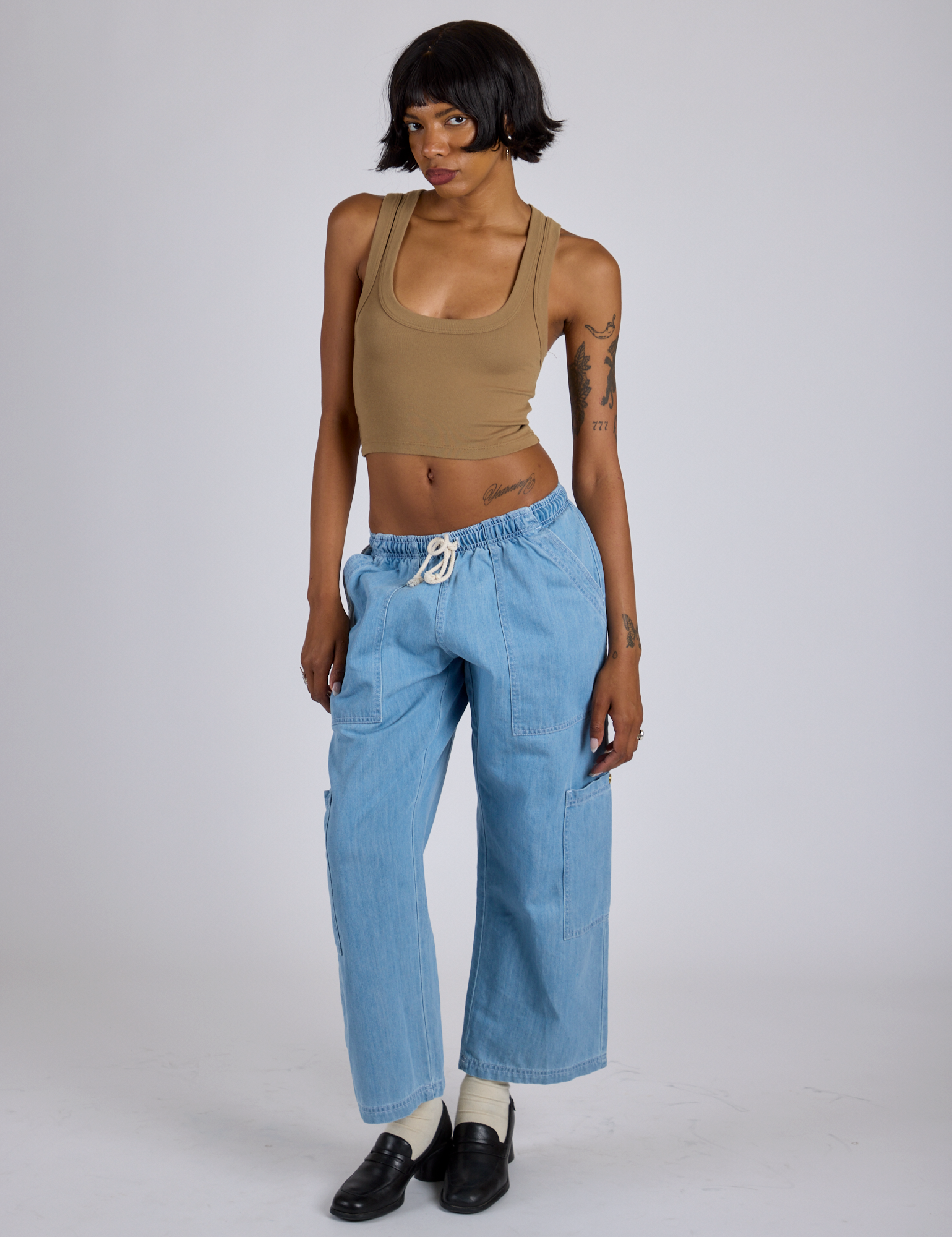 Cropped Tank Top in Desert Brown and light wash Denim Drop Pocket Pants on Kira
