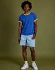 Jerrod is wearing Vintage Ringer Tee in Royal Blue and light wash Carpenter Shorts