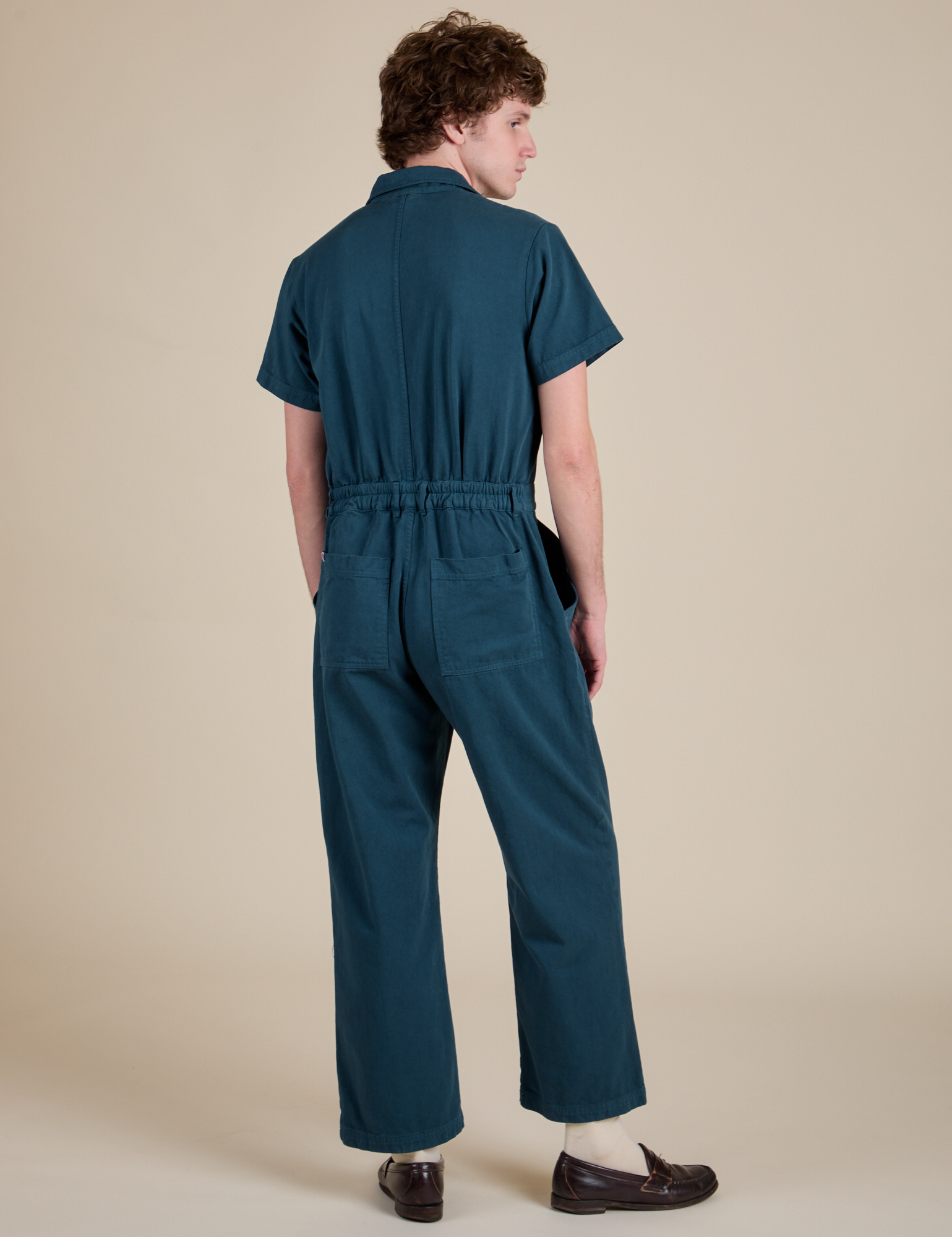 Short Sleeve Jumpsuit in Lagoon back view on Quinn