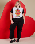 Juliet is wearing Vintage Tee in Don't Call Me paired with black Western Pants