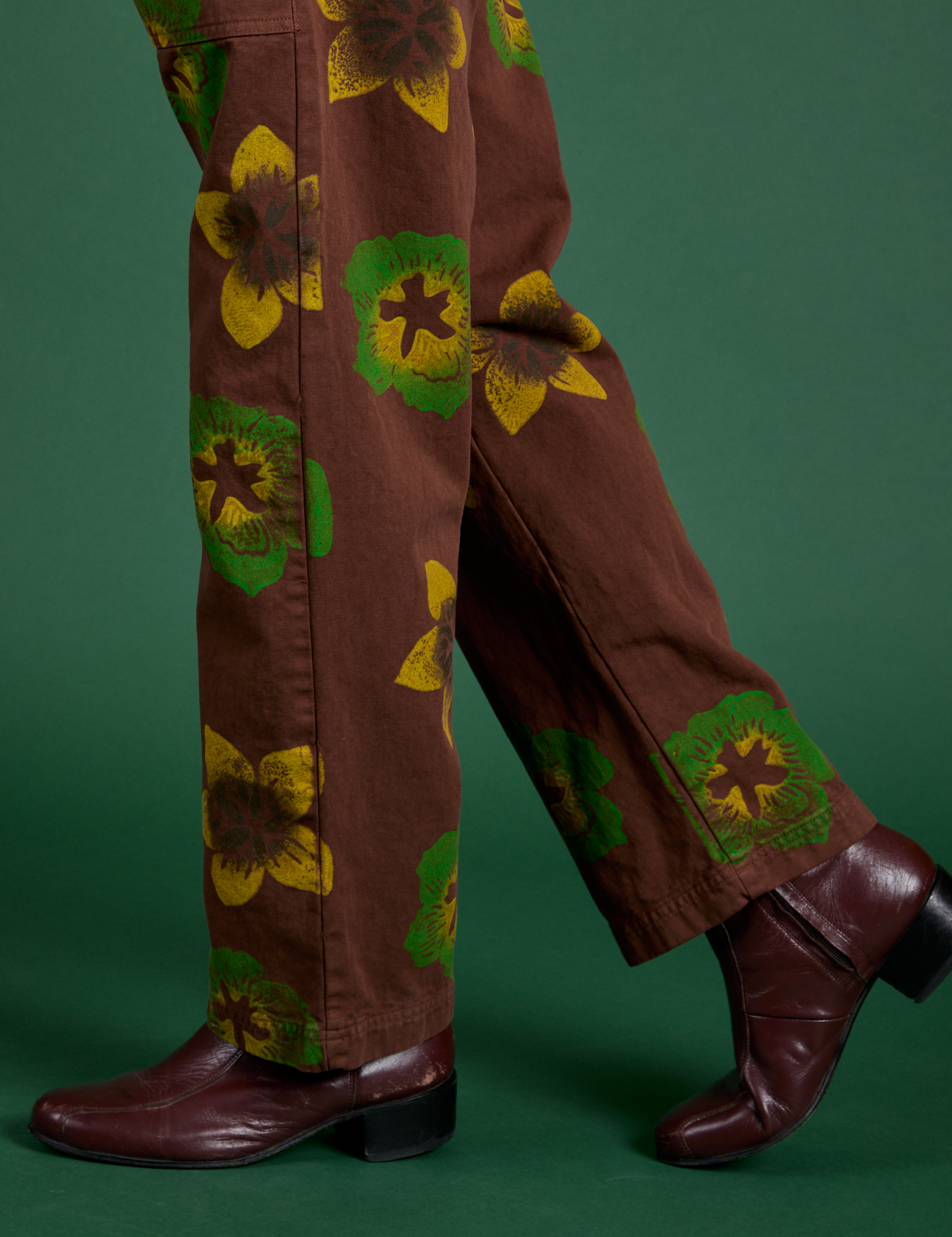 Floral Painted Work Pants in Brown pant side view close up on Jesse