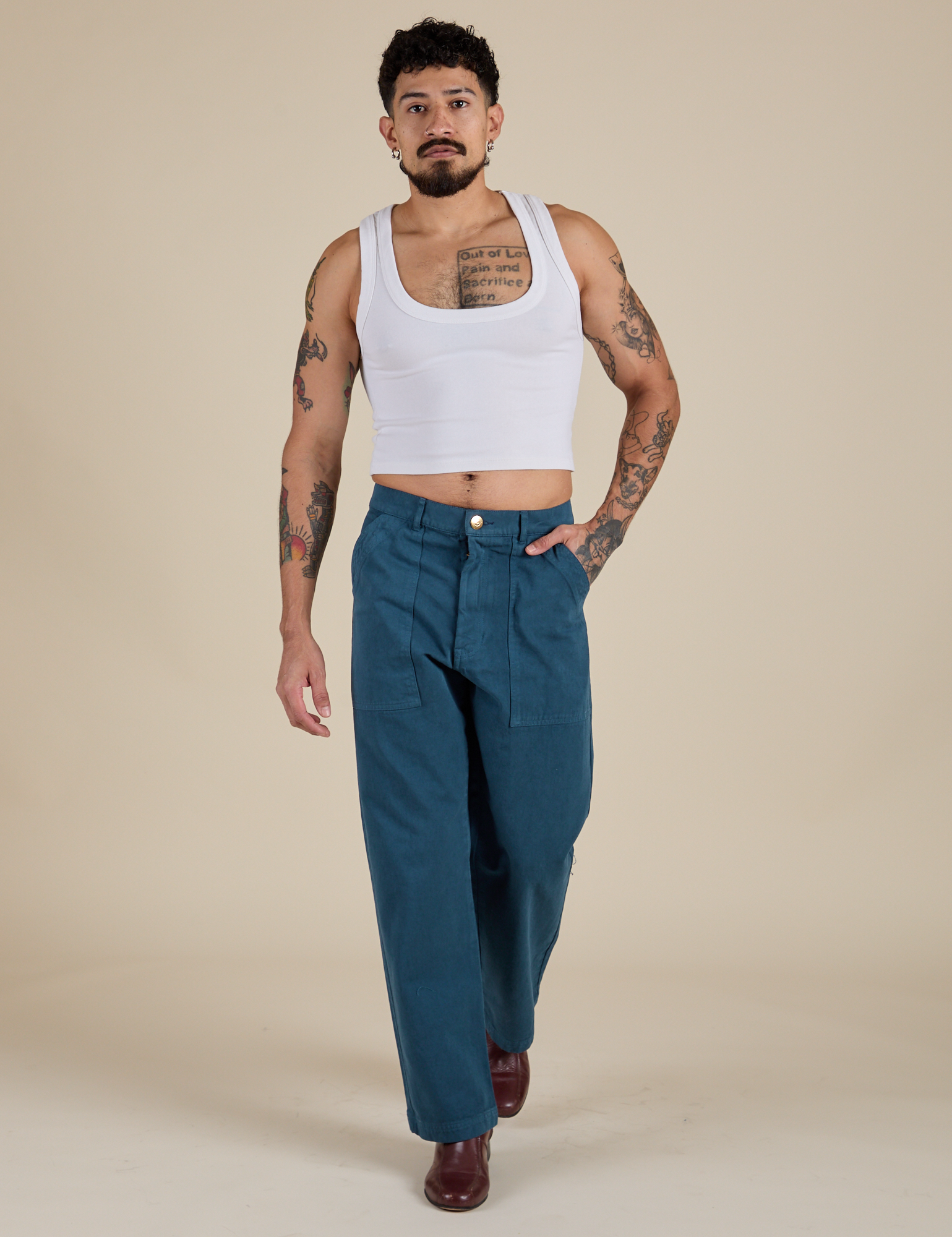 Work Pants in Lagoon and vintage tee white Cropped Tank on Jesse