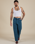 Work Pants in Lagoon and vintage tee white Cropped Tank on Jesse
