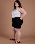 Side view of Classic Work Shorts in Basic Black and Cropped Tank in Vintage Tee White on Ashley