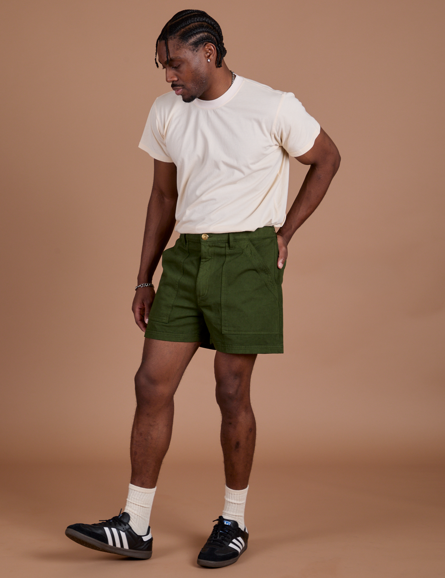 Angled front view of Classic Work Shorts in Evergreen and The Organic Vintage Tee in Vintage Off-White